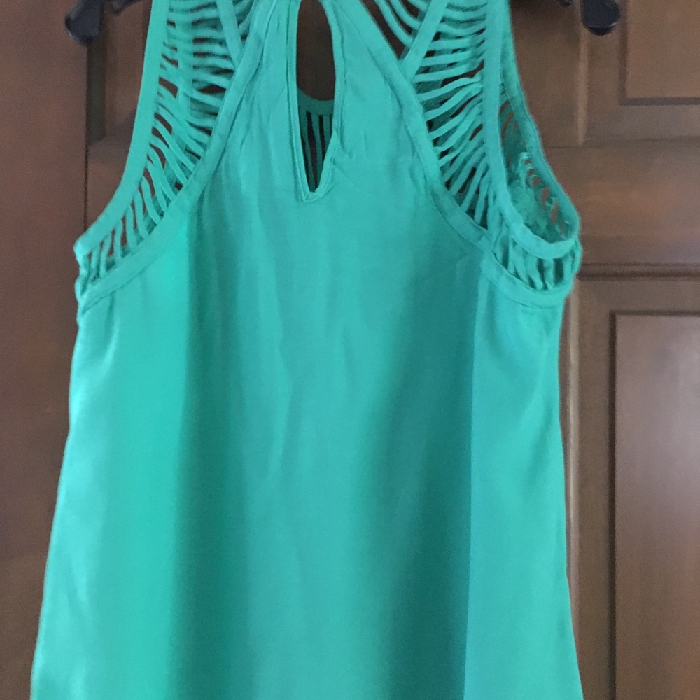 Sleeveless top with cut out yoke